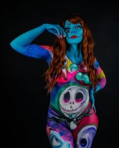 Colorful body paint featuring fantasy and horror elements with a model in vibrant makeup.